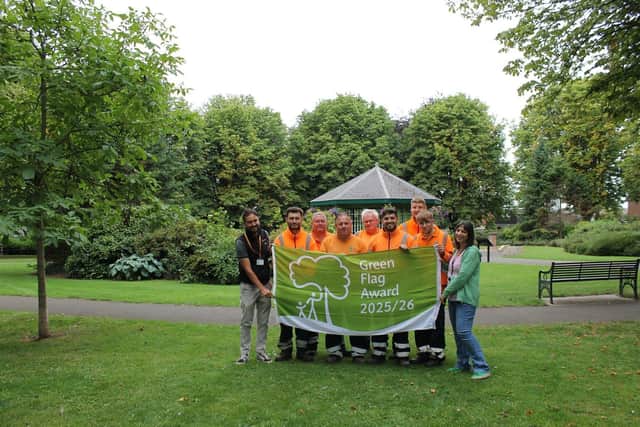 The dedicated landscape team celebrating Green Flag success at Crossley Park, Ripley, alongside Richard Hodgkinson, Open Spaces Officer, and Councillor Amina Burslem from Amber Valley Borough Council.
