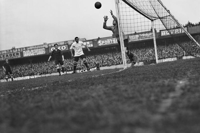 Tottenham Hotspur goalkeeper Arthur King making a save during a match against Derby County at White Hart Lane stadium on September 13th 1913. The final score was 1-1.