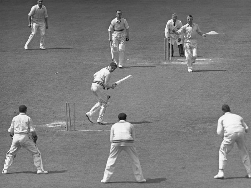 Derbyshire's Alan Revill looks down at the stumps after being clean bowled for 0 by Eddie Watts during the first innings of their County Championship match againast Surrey on 20th June 1946 at the Kennington Oval. The match was drawn.