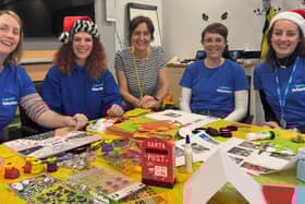 Lubrizol employees Charlotte Hyman, Claire Hollingshurst, Emma Fahey and Lucy Armstrong taking part in Sharron Wilkinson's (pictured centrally) 'Give ... a few words' campaign