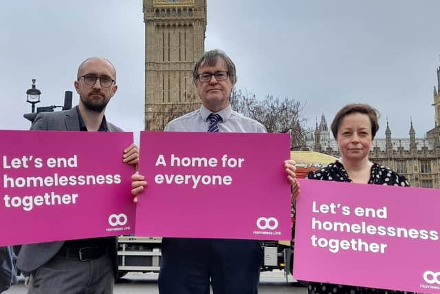 Andrew Redfern (centre) campaigning in London
