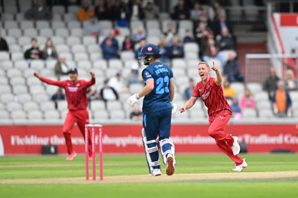 Luke Wood celebrates the wicket of Caleb Jewell with the first ball of the Derbyshire innings. Picture: Dan Adams/Lancashire CCC.