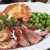 As tempting as it may be to give your dog a little treat during a roast dinner, certain foods can be harmful to them. 

Dr Linda said: "While lean chicken meat is absolutely fine to give to our dogs, we need to be cautious of offering too much skin as chicken skin is high in fat, causing pancreatitis in susceptible dogs. Stuffing is generally a ‘no-no’ for dogs as it contains onion and garlic. If eaten in large quantities, these allium plants can cause red blood cells to break down and can cause anaemia. Some gravies may be safe, but richer gravies with butter or meat fat are too high in fat and salt and can cause stomach upsets and pancreatitis. Overall, Veggies are the safest option if you want to share, but avoid those cooked in fat or butter. Boiled carrots, parsnips, sprouts, and potatoes are good choices."

To be safe, stick to dog-friendly treats and avoid feeding your pups human food.