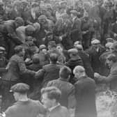 A game of Shrovetide football, ' kicked - off ' by the Prince of Wales in Ashbourne, is getting rather rough, in February 1928.
