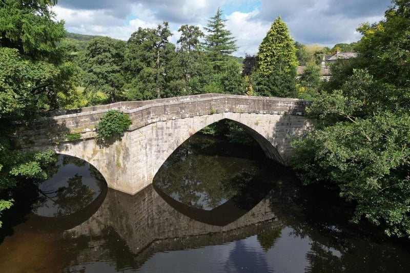 Idyllically situated on the banks of the river Wye, Bakewell is the biggest town in the Peak District National Park. With mellow stone buildings, a medieval five-arched stone bridge and quaint courtyards, it's a magnet for painters, photographers and sightseers alike.