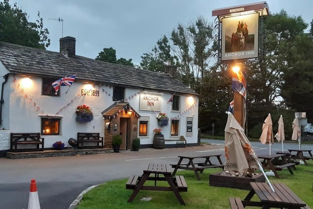 Classic pub serving British eats & cask ales amid woodsy decor, plus a beer garden and open log fires.