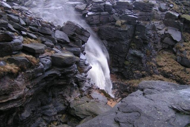 It might take a few hours to reach this spot, but it is well worth the climb for the amazing views of this waterfall on the edge of Kinder Scout.