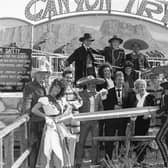 The American Adventure theme park may was a hugely popular choice among families in the city for a day out during the 90s. Samuel Magdaleno is pictured here opening Mexicoland at the attraction in May 1991.