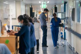 File photo dated 18/01/23 of a general view of staff on a NHS hospital ward, as NHS waiting lists could top eight million by next summer, regardless of whether medics continue striking over pay, according to new analysis.