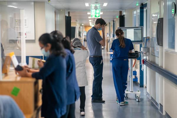 File photo dated 18/01/23 of a general view of staff on a NHS hospital ward, as NHS waiting lists could top eight million by next summer, regardless of whether medics continue striking over pay, according to new analysis.