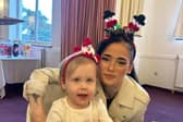 Harley McComiskie and daughter Aurora at the community Christmas party at Freemasons Hall in Littleover