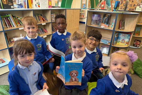 Year 1 Pupils at Beaufort Primary School showing off their Blue Peter badges