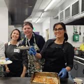 The Penguin PR team serving up at the YMCA community meal