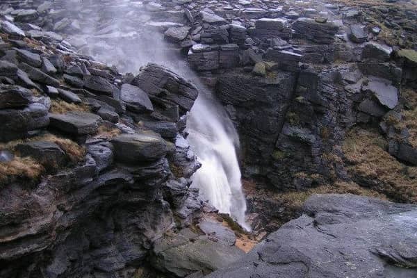 It might take a few hours to reach this spot, but it is well worth the climb for the amazing views of this waterfall on the edge of Kinder Scout.