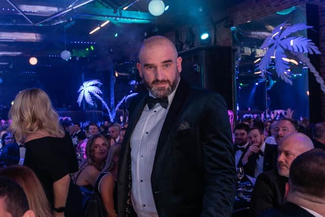 Craig Vladimirovs heads to the stage to collect his award