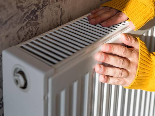 Warming hands.
