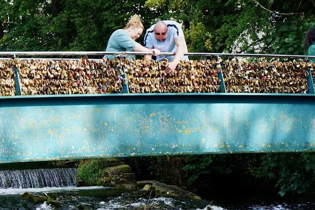 People have been returning to the bridge throughout the summer to retrieve locks with special significance. (Photo: Brian Eyre/Derbyshire Times)