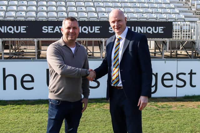 Purpose Media managing director Matt Wheatcroft celebrates the business becoming an Official Partner of Derbyshire County Cricket Club with DCCC chief executive Ryan Duckett at the County Ground.