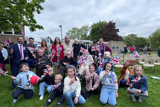 Deaf children and pensioners celebrate VE Day together at Royal School for the Deaf Derby.