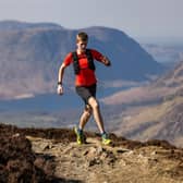 Alex running on Fleetwith Pike, The Lake District. Photo Credit: Dave MacFarlane.