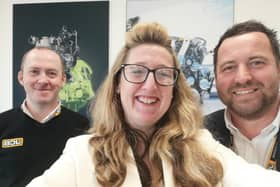 Sheila with JCB's Managing Director Robert Taylor and the  HSE & Facilities Manager Steven Mullen.jpg