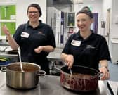 Marie Carmon and Sophie Jepson serve up a community meal at YMCA Derbyshire