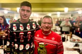 Alex Haythornethwaite and Dave Adams in their Christmas jumpers