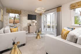 BM - The living room inside a show home at Barratt Homes' Midshire Meadow