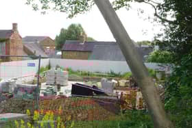 Trees have been felled in a Derbyshire market town. The site shows work being carried out at 21 Market Place, Melbourne.