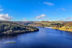 An aerial view of Ladybower Reservoir and the the A57 Snake Pass making its way through the Peak District and over the Pennines. It is an area that afford unrivalled views of the Peak District.