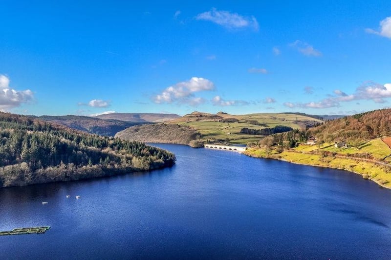 An aerial view of Ladybower Reservoir and the the A57 Snake Pass making its way through the Peak District and over the Pennines. It is an area that afford unrivalled views of the Peak District.