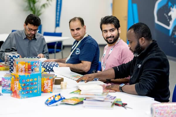 The literacy kits, which contain items like Roald Dahl books, bookmarks and handwritten notes, were packed by 14 Amazon volunteers and donated to the West Midlands Multibank.