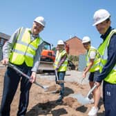 Andrew Redfern (left) breaking ground for new Framework accommodation