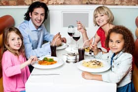 Give mum a break from cooking by treating her to a meal out on Mother's Day (generic image: Adobe Stock)