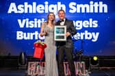 Ashleigh receiving her award from Dan Archer, UK CEO of Visiting Angels